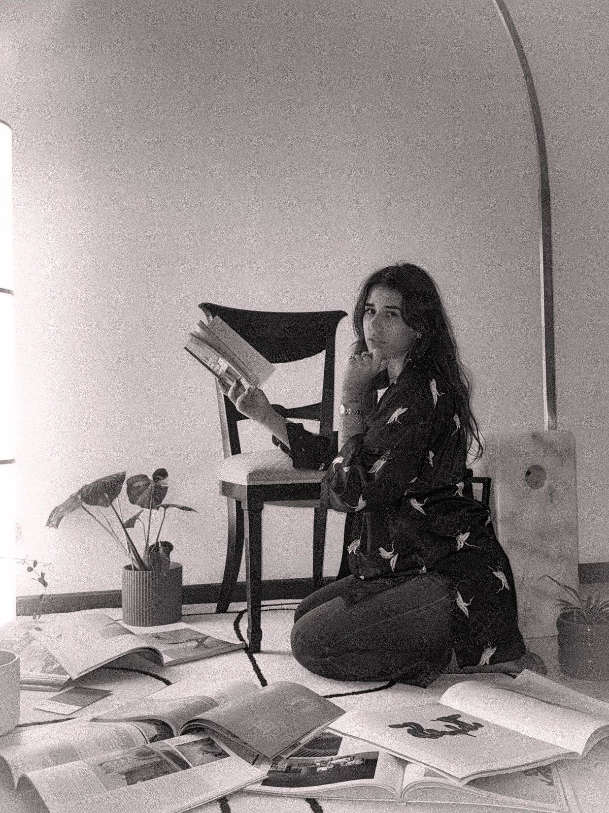 Lucia exploring design books and creative ideas
