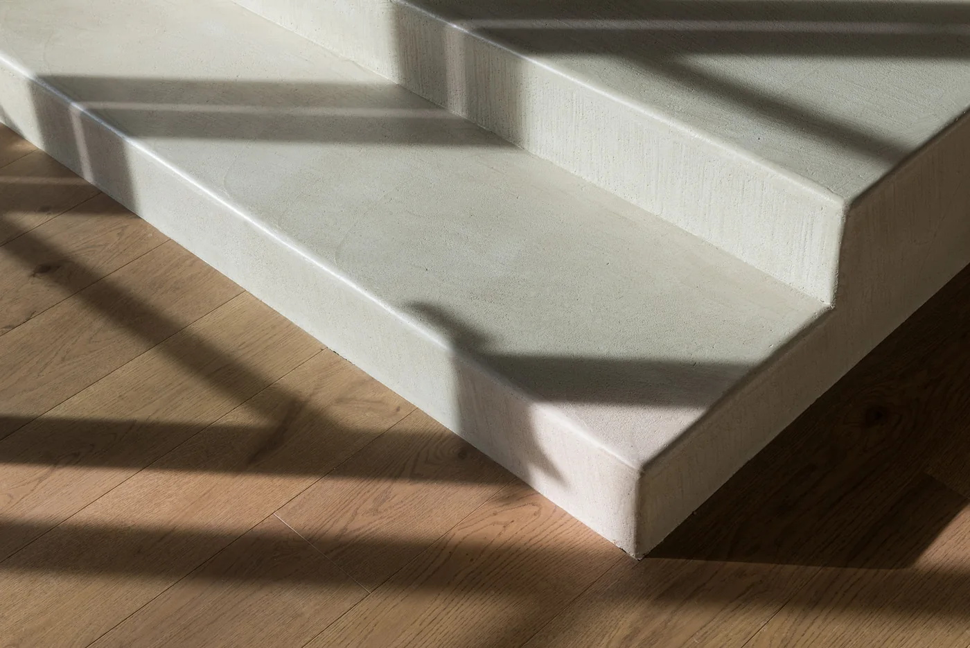 Detailed view of a contemporary stair and oak floor